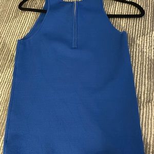 Ecru sleeveless top zipper in the back. Style number 918OSW